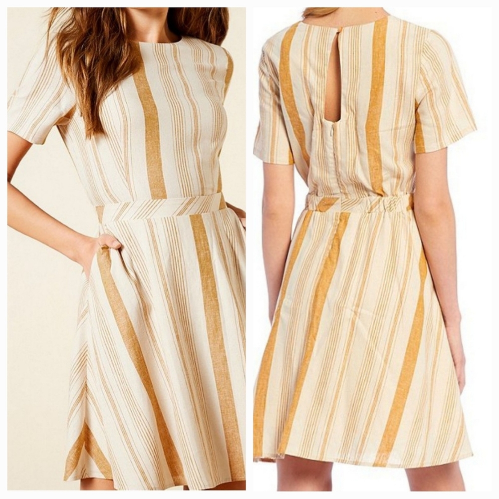 a loves a Boho, minimalist and retro style dress! Size Medium.